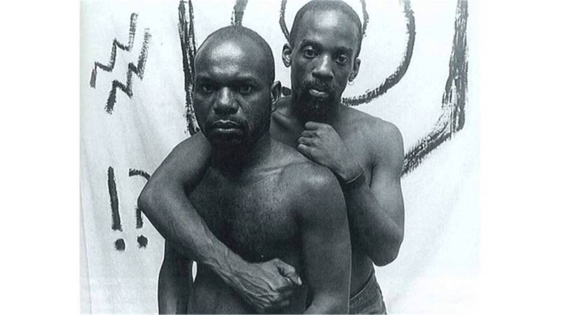 Poet Essex Hemphill  and filmmaker Marlon Riggs in a photo featured in advertisements for Riggs’ iconic film Tongues Untied, a landmark text in Black queer cultural production.